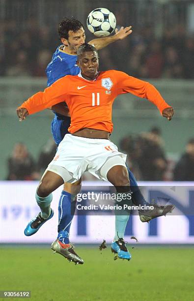 Gianluca Zambrotta of Italy clashes with Eljero Elia of Holland during the international friendly match between Italy and Holland at Adriatico...