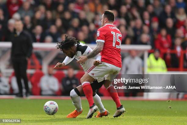 Kasey Palmer of Derby County and Lee Tomlin of Nottingham Forest during the Sky Bet Championship match between Nottingham Forest and Derby County at...