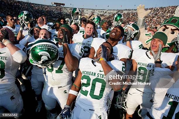 Members of the Michigan State Spartans celebrate their win over the Purdue Boilermakers at Ross-Ade Stadium on November 14, 2009 in West Lafayette,...