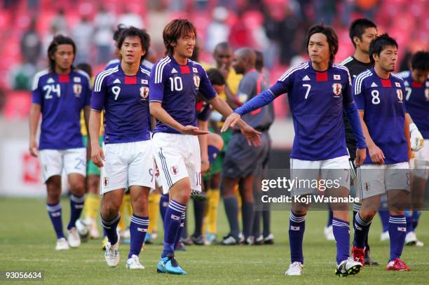 Shunsuke Nakamura and Yasuhito Endo and Shinji Okazaki and Daisuke Matsui of Japan look on after the international friendly match between South...