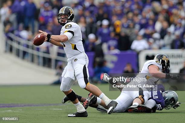 Quarterback Blaine Gabbert of the Missouri Tigers looks down field as he gets ready to throw the ball in the fourth quarter against the Kansas State...