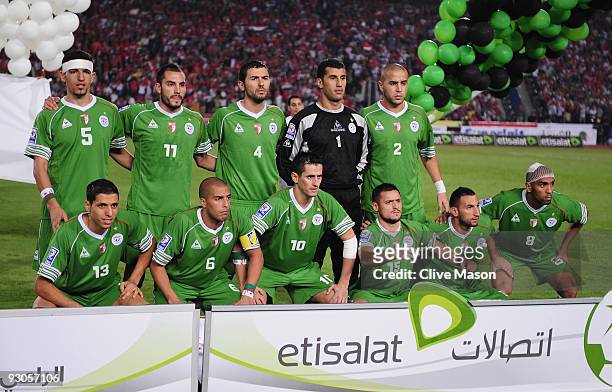 The Algeria football team line up for a team photograph prior to the FIFA2010 World Cup qualifying match between Egypt and Algeria at the Cairo...