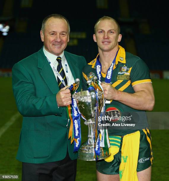 Tim Sheens the coach of Australia and Darren Lockyer the captain lifts the Gillette Four Nations Trophy after victory over England in the Four...