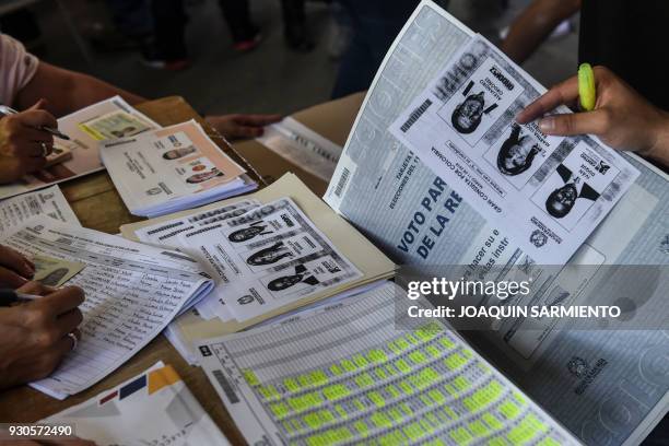 Photocopies of ballots for one of the two main political blocs holding primary elections at the same time of the parliamentary elections in Colombia,...