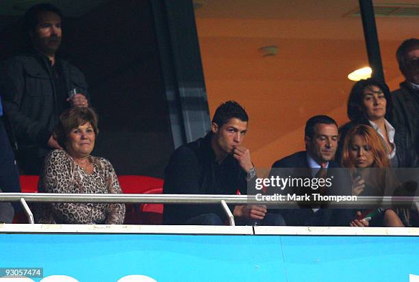 Cristiano Ronaldo of Portugal watches the game from a hospitality box during the FIFA 2010 European World Cup qualifier first leg match between...