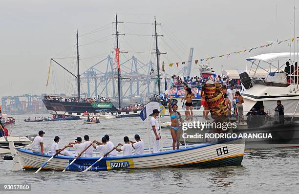 Boyaca department's contestant Cindy Marion waves during the "Desfile en Balleneras" in Cartagena, Colombia, on November 14 prior to Miss Colombian...