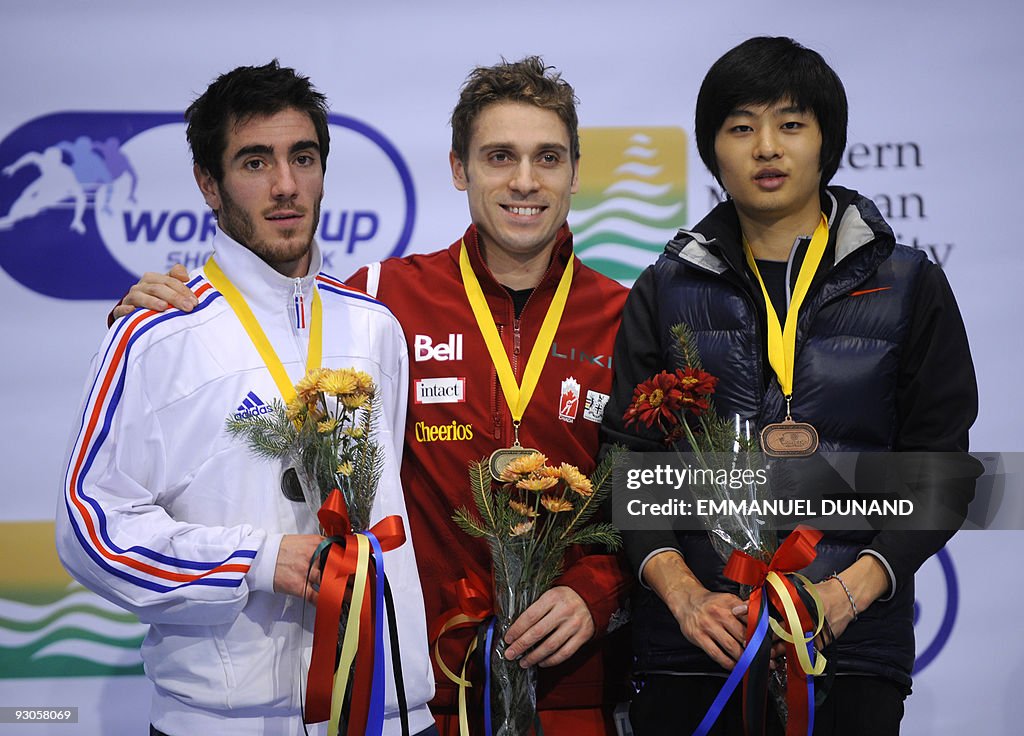 Canada's Francois-Louis Tremblay (C), wi
