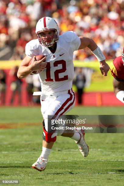 Quarterback Andrew Luck of the Stanford Cardinal carries the ball against the USC Trojans on November 14, 2009 at the Los Angeles Coliseum in Los...