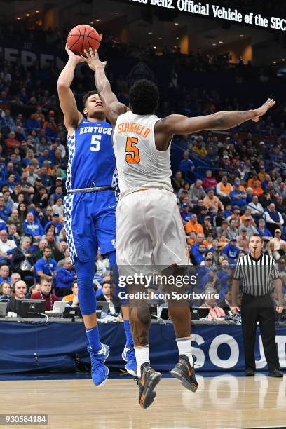 Tennessee forward Admiral Schofield tries to block a shot by Kentucky forward Kevin Knox during a Southeastern Conference Basketball Tournament game...