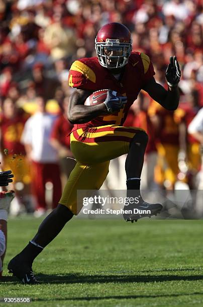 Running back Joe McKnight of the USC Trojans breaks away on a 28 yard touchdown run against the Stanford Cardinal on November 14, 2009 at the Los...