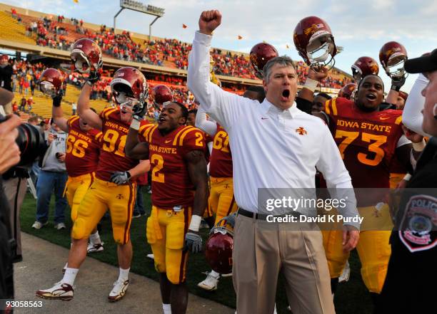 Iowa State Cyclones head coach Paul Rhoads celebrates with his team after their win over the Colorado Buffaloes at Jack Trice Stadium on November 14,...