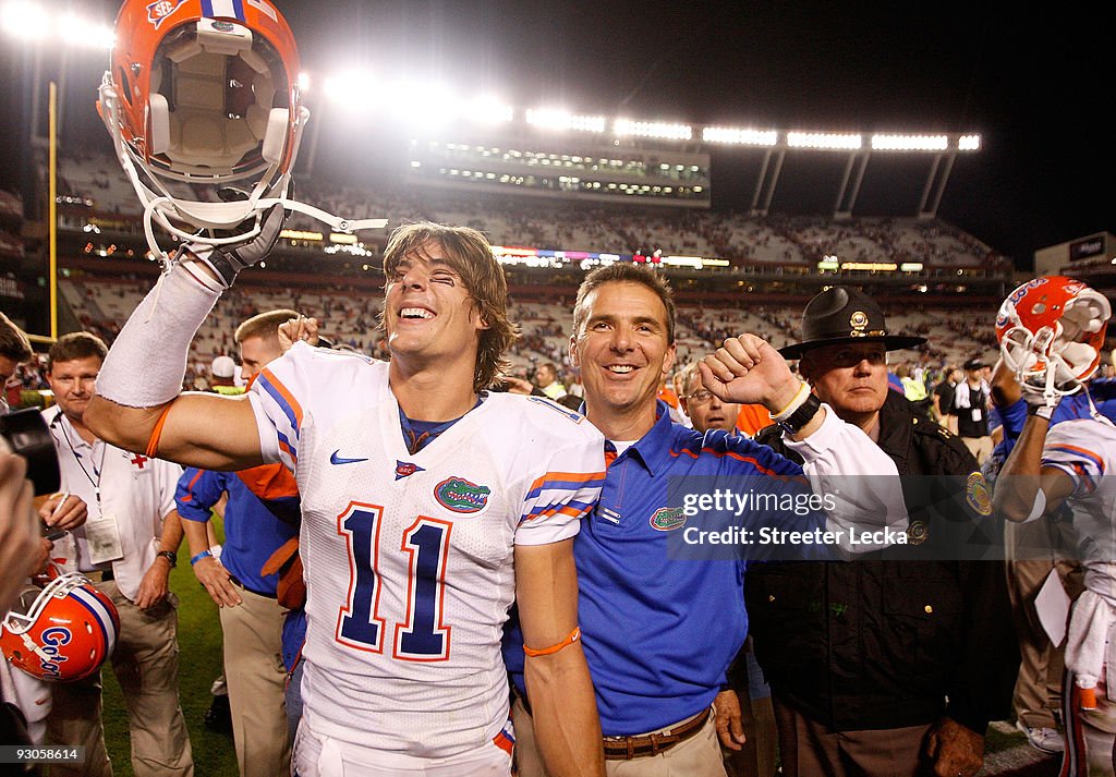 Florida Versus Riley Head coach Urban Meyer and Riley Cooper of the Florida Gators... News ...