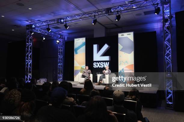 Richard Linklater and Olivier Assayas speak onstage at A Conversation with Olivier Assayas during SXSW at Austin Convention Center on March 11, 2018...