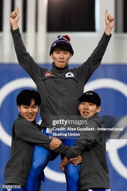 Do Hyung Lee, Min Seok Kim and Jaewon Chung of Korea stand on the podium after winning the men's team pursuit during the World Junior Speed Skating...