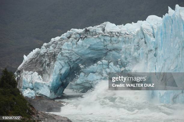 Chuncks of ice come off from the Perito Moreno Glacier, at Los Glaciares National Park, near El Calafate in the Argentine province of Santa Cruz, on...