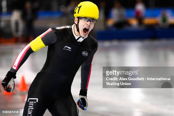 David la Rue of Canada celebrates after winning the men's mass start during the World Junior Speed Skating Championships at the Utah Olympic Oval on...