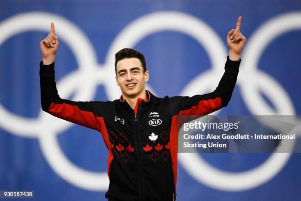 David la Rue of Canada celebrates after winning the men's mass start during the World Junior Speed Skating Championships at the Utah Olympic Oval on...