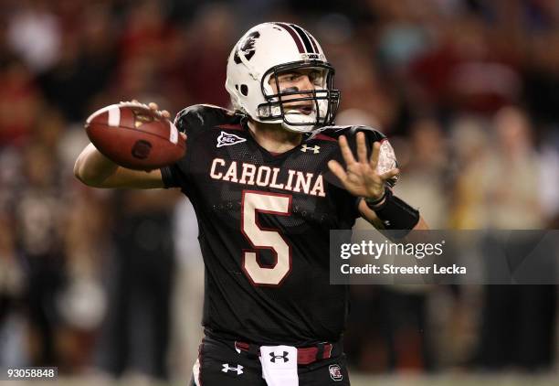 Stephen Garcia of the South Carolina Gamecocks drops back to pass the ball against the Florida Gators during their game at Williams-Brice Stadium on...