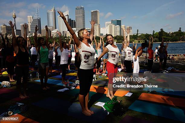 Annalise Braakensiek and Camilla Franks take part in the Yoga Aid Sydney Challenge 2009 at Mrs Macquaries Point in the Royal Botanic Gardens Sydney...