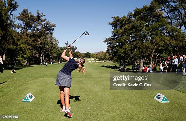 Paula Creamer of the United States tees off the seventh hole during the third round of the Lorena Ochoa Invitational Presented by Banamex and Corona...