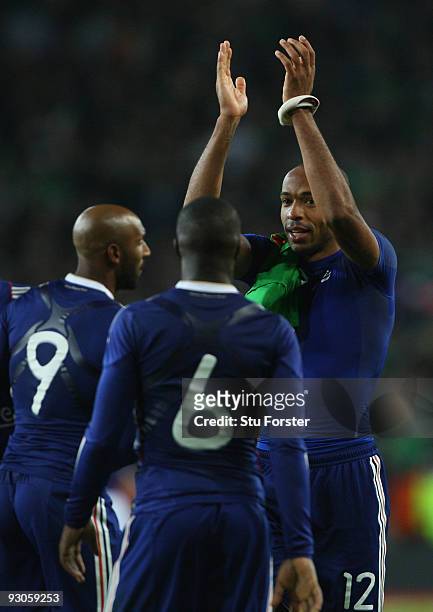 France forward Nicolas Anelka and Thierry Henry celebrate at the end of the FIFA 2010 World Cup Qualifier play off first leg between Republic of...