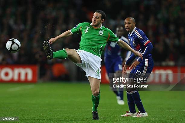 France forward Thierry Henry looks on as Ireland defender John O'Shea intercepts a ball during the FIFA 2010 World Cup Qualifier play off first leg...
