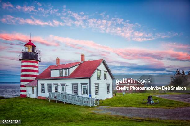 west quoddy lighthouse at twilight in lubec maine - west quoddy head lighthouse stock-fotos und bilder