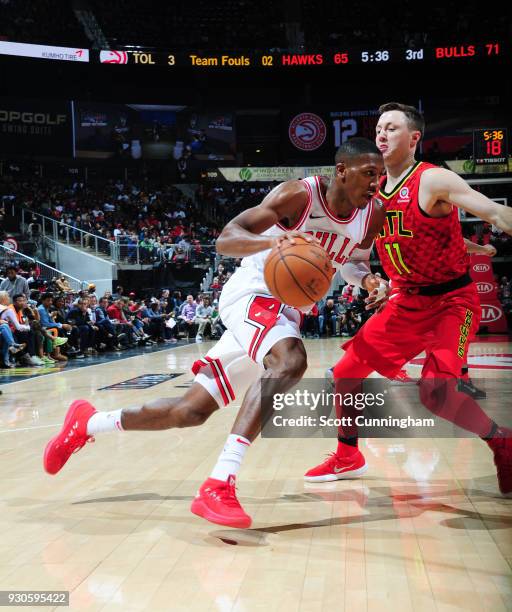 Kris Dunn of the Chicago Bulls handles the ball against the Atlanta Hawks on March 11, 2018 at Philips Arena in Atlanta, Georgia. NOTE TO USER: User...