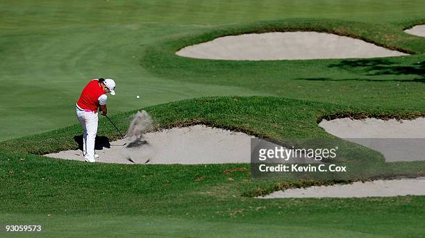 Jiyai Shin of South Korea plays her second shot from a sand trap on the seventh hole during the third round of the Lorena Ochoa Invitational...