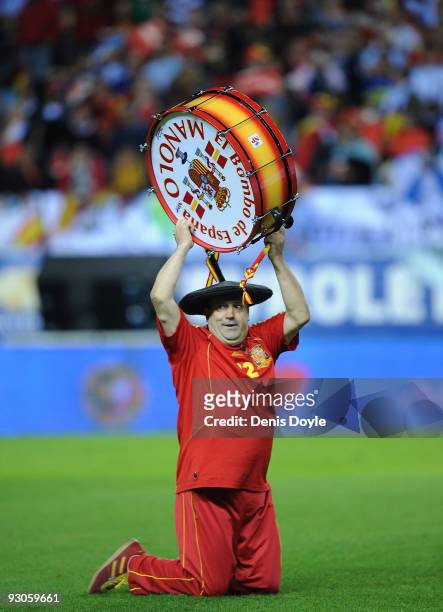 Spanish fan known as 'Manolo El Bombo' animates the crowd before the start of the International friendly match between Argentina and Spain at the...