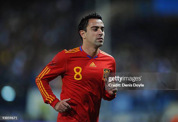 Xavi Hernandez of Spain goes to take a corner kick during the International friendly match between Argentina and Spain at the Vicente Calderon...
