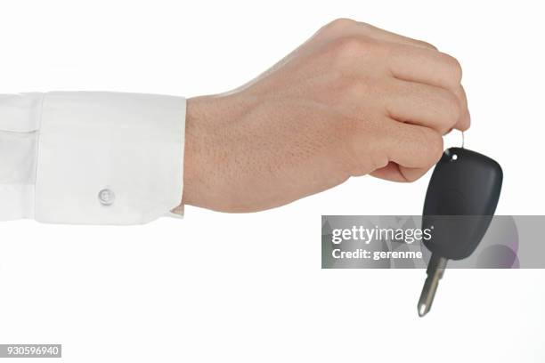 handing the car key - car keys on white stock pictures, royalty-free photos & images