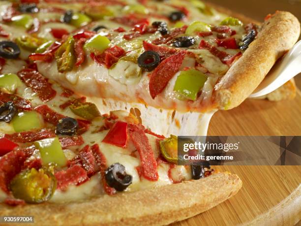 taking a pizza slice - pastrami slice stock pictures, royalty-free photos & images