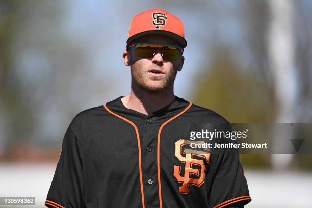 Josh Rutledge of the San Francisco Giants warms up for the spring training game against the Kansas City Royals at Scottsdale Stadium on February 26,...