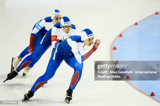 Karina Akhmetova, Ekaterina Kosheleva and Irina Kuznetsova of Russia perform in the ladies team pursuit during the World Junior Speed Skating...