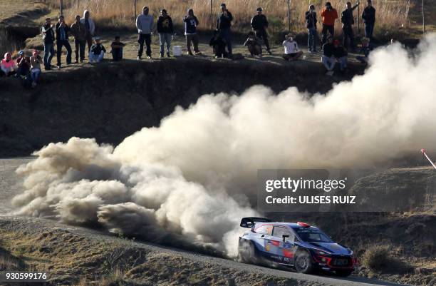 Spanish Dani Sordo and co-driver Carlos Del Barrio steer their Hyundai i20 Coupe WRC during the final day of the 2018 FIA World Rally Championship in...