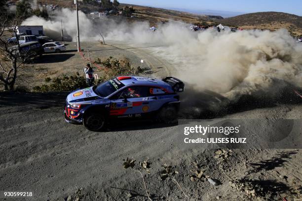 Spanish Dani Sordo and co-driver Carlos Del Barrio steer their Hyundai i20 Coupe WRC during the final day of the 2018 FIA World Rally Championship in...