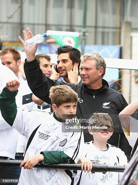 Ricki Herbert head coach of the All Whites waves to the fans dduring a victory parade through the CBD on November 15, 2009 in Wellington, New...