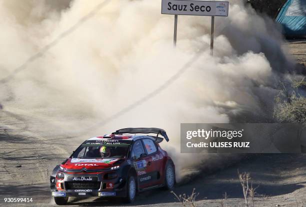 French Sebastien Loeb and co-driver monegasque Daniel Elena steer their Citroen C3 during the final day of the 2018 FIA World Rally Championship in...