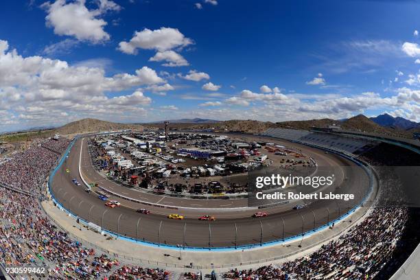 Cars race during the Monster Energy NASCAR Cup Series TicketGuardian 500 at ISM Raceway on March 11, 2018 in Avondale, Arizona.