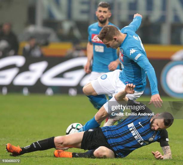 Marko Rog of SSC Napoli competes for the ball with Marcelo Brozovic of FC Internazionale Milano during the serie A match between FC Internazionale...