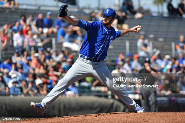 Brian Flynn of the Kansas City Royals delivers a pitch in the first inning of the spring training game against the San Francisco Giants at Scottsdale...
