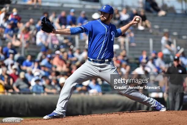 Brian Flynn of the Kansas City Royals delivers a pitch in the first inning of the spring training game against the San Francisco Giants at Scottsdale...