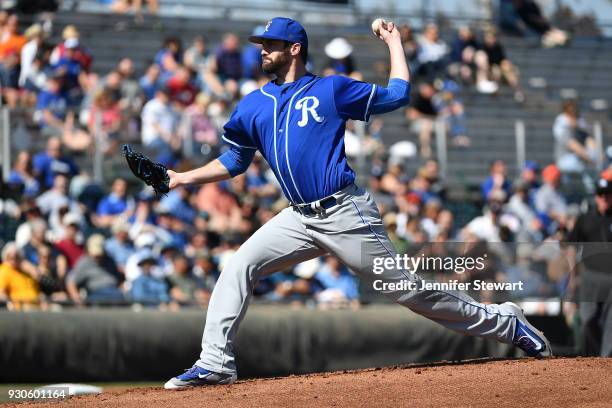 Brian Flynn of the Kansas City Royals delivers a pitch in the first inning of the spring training game against the San Francisco Giants at Scottsdale...