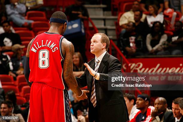 New Jersey Nets Head Coach Lawrence Frank leads Terrence Williams against the Miami Heat on November 14, 2009 at American Airlines Arena in Miami,...