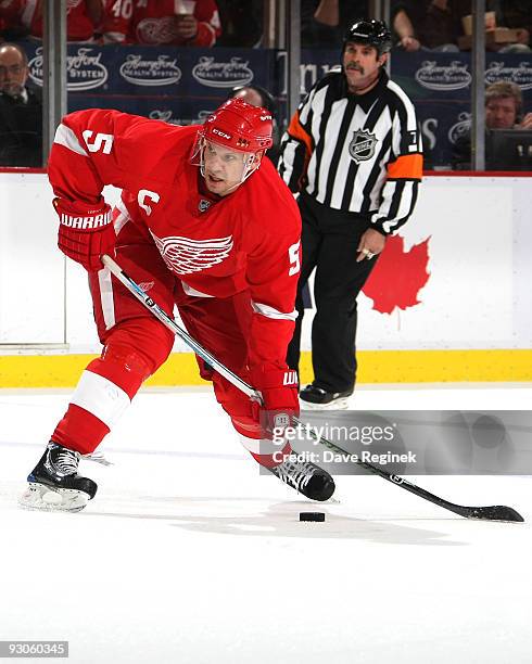 Nicklas Lidstrom of the Detroit Red Wings looks to make a shot during a NHL game against the Anaheim Ducks at Joe Louis Arena on November 14, 2009 in...