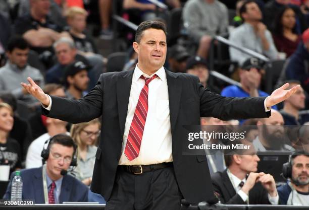 Head coach Sean Miller of the Arizona Wildcats reacts to an official's call during the championship game of the Pac-12 basketball tournament against...