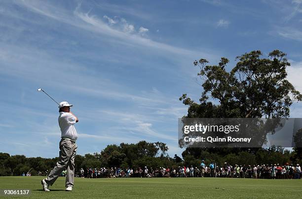 Jason Dufner of the USA plays an approach shot on the 3rd hole during the final round of the 2009 Australian Masters at Kingston Heath Golf Club on...