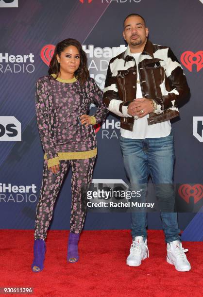 Angela Yee and DJ Envy arrive at the 2018 iHeartRadio Music Awards which broadcasted live on TBS, TNT, and truTV at The Forum on March 11, 2018 in...