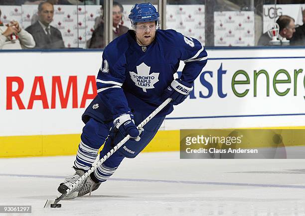 Phil Kessel of the Toronto Maple Leafs skates with the puck in a game against the Calgary Flames on November 14,2009 at the Air Canada Centre in...